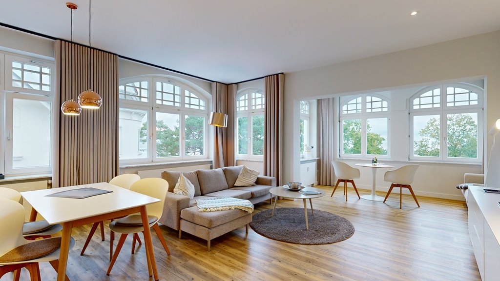 Gemütlicher Wohnbereich mit Flachbildschirm - Villa Sirene Binz