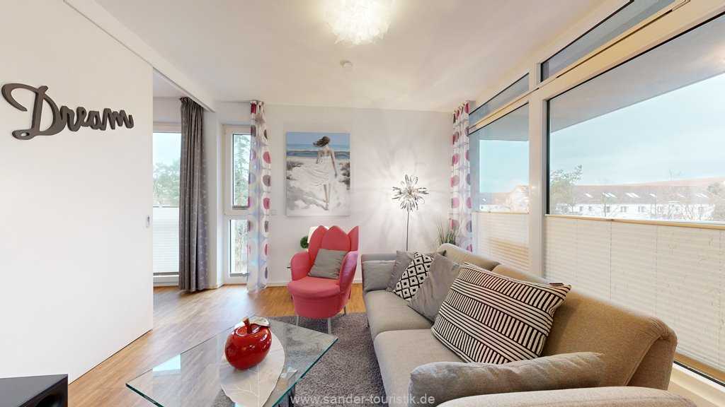 Wohnzimmer mit Zugang zum Balkon - Binz- DünenResort Wohnzimmer mit Zugang zum Balkon - Binz- DünenResort