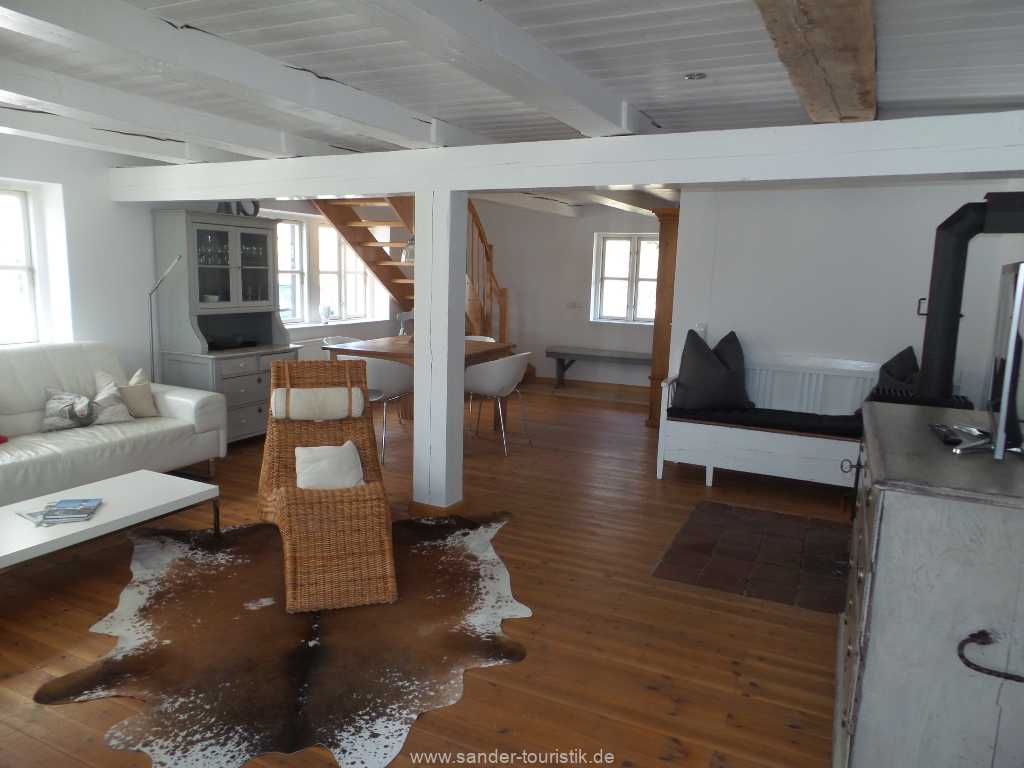 Wohnraum mit Holzofen - Boddenblick II - Mönchgut Wohnraum mit Holzofen - Boddenblick II - Mönchgut